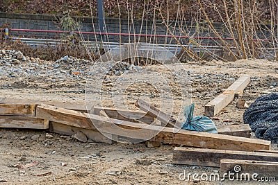 Sections of lumber scattered haphazardly Stock Photo