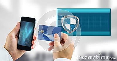 Secure transaction shield icon and phone with bank card Stock Photo
