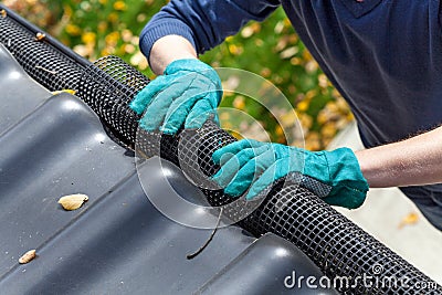 Securing gutters Stock Photo