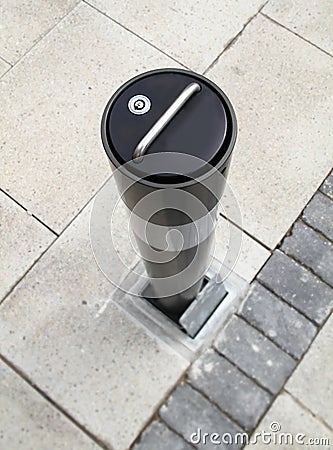 Security bollard on a high street Stock Photo