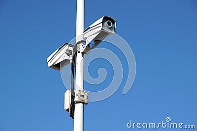 Security camera with blue sky Stock Photo