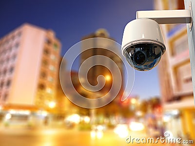 Security camera or cctv camera with cityscape background Stock Photo