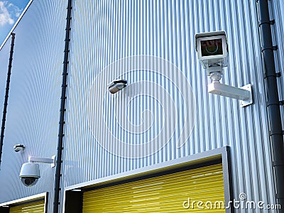 Security camera in warehouse Stock Photo