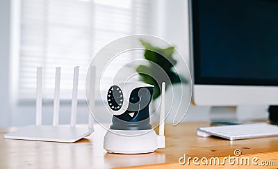 Security camera on Wood table. IP Camera Stock Photo