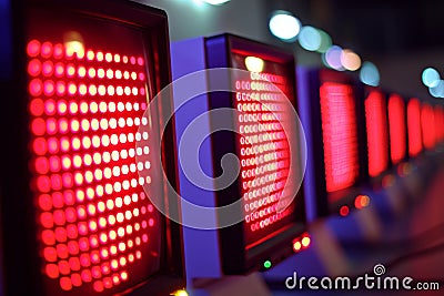In a security dashboard, red warnings of blocked attacks flash as a robust firewall repels hacking attempts. Stock Photo