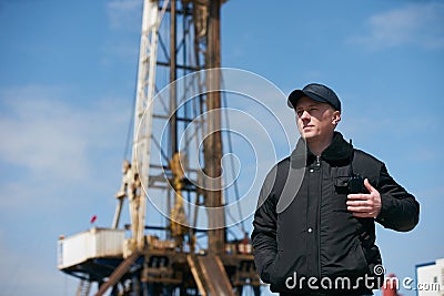 Security guard in black uniform with walkie talkie Stock Photo