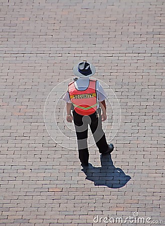 Security guard directing traffic Stock Photo