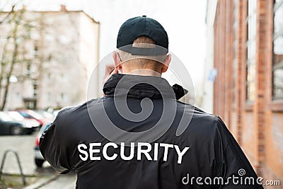 Security Guard Wearing Jacket Stock Photo