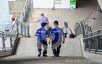 Security guards at train station Editorial Stock Photo