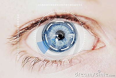 Security Iris Scanner on Intense Blue Human Eye Stock Photo