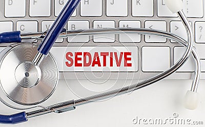 PROLAPSE word with Stethoscope on keyboard on grey background Stock Photo