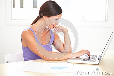 Seductive adult female working on the computer Stock Photo