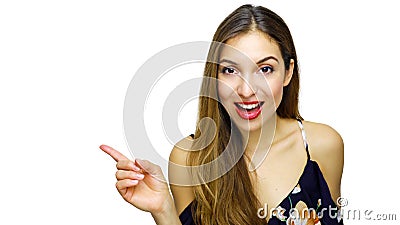 Seductive elegant woman in blue flowered dress pointing finger and looks at camera isolated on white background Stock Photo