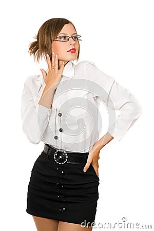 Seductive girl in a black skirt and white shirt Stock Photo