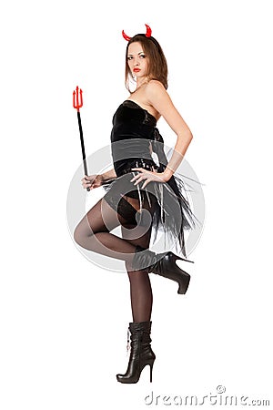Seductive girl is wearing a devil costume Stock Photo