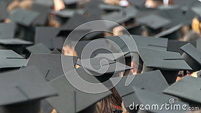 A see of graduation caps at a graduation ceremony Stock Photo