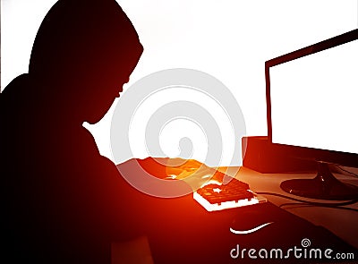 See from the side .Computer hacker working Stock Photo