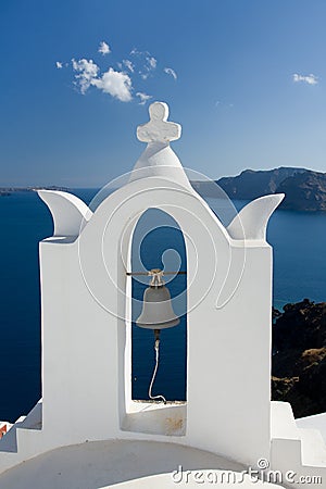 See view through church arch bell Santorini Greece Stock Photo