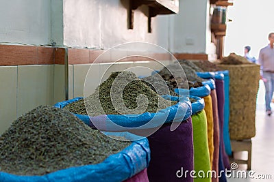 Seeds and spices in canvas bags at the traditional souk market in the medina or old town of Marrakech, Morocco Stock Photo