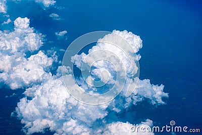 Seeing through airplane window and see overview city.Clouds in the sky and cityscapes though airplane window Stock Photo