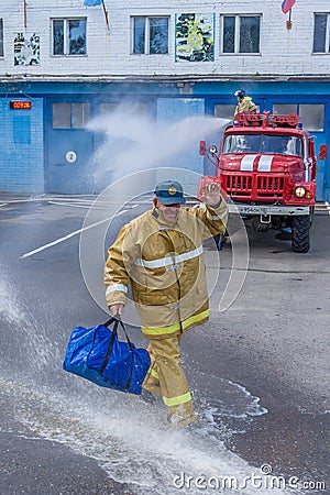 Seeing off the retirement of a firefighter in Russia. Editorial Stock Photo