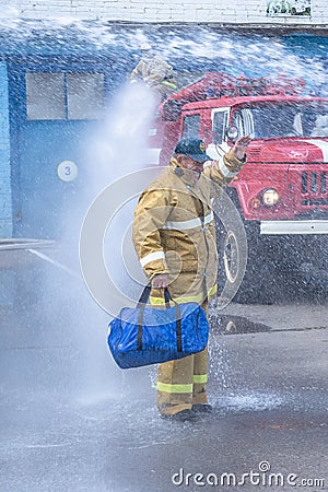 Seeing off the retirement of a firefighter in Russia. Editorial Stock Photo