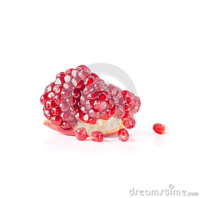 Segment of ripe pomegranate with seeds isolated on white background. Stock Photo