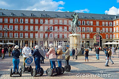 Segway tour Mayor Plaza. Madrid Editorial Stock Photo