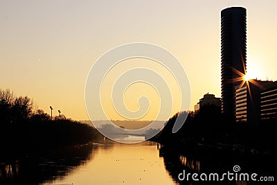 Seine River in Puteaux and Puteaux island at sunset near La defense. From pont de Neuilly. Editorial Stock Photo