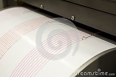 Seismograph recording earthquake Stock Photo