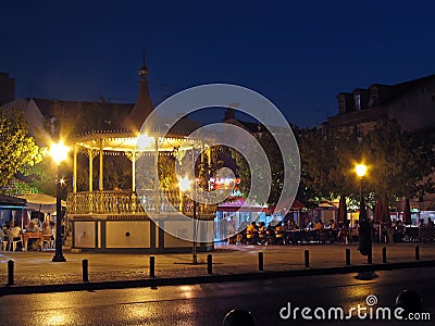 Seixal, Portugal. June 3, 2023: Bandstand in Amora by night with open air restaurants and bars in the square. Editorial Stock Photo