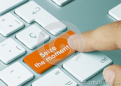 Seize the moment - Inscription on Orange Keyboard Key Stock Photo