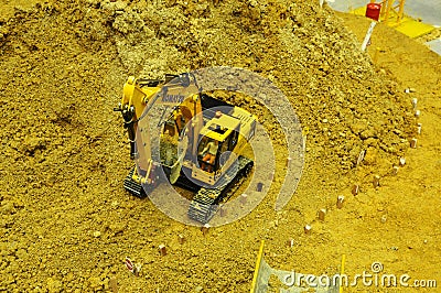Selected focused on remote control construction machinery toys. Editorial Stock Photo