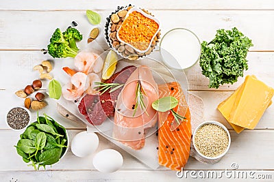 Selection of animal and plant protein sources on wood background Stock Photo