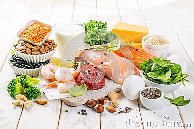 Selection of animal and plant protein sources on wood background Stock Photo