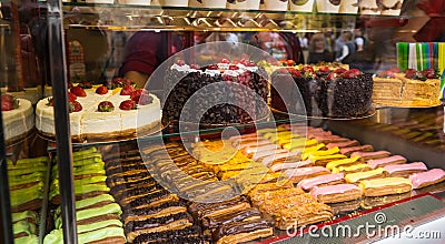 Selection of Cakes and Pastries in Bakery Window Stock Photo