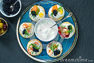 Selection of cocktail blinis - gourmet party food Stock Photo