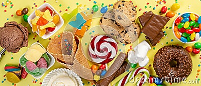 Selection of colorful sweets - chocolate, donuts, cookies, lollipops, ice cream Stock Photo