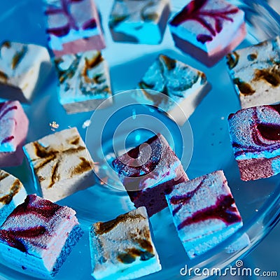 Selection of decorative desserts on buffet table at catered event Stock Photo