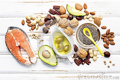 Selection food sources of omega 3 and unsaturated fats. Super foods high vitamin e and dietary fiber for healthy food on wooden Stock Photo