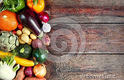 Selection of fresh autumn vegetables in a border Stock Photo