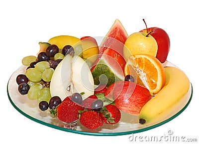 Selection of fruit on glass plate Stock Photo