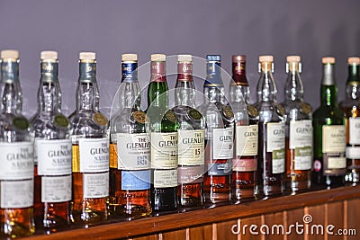 BALLINDALLOCH, MORAY / SCOTLAND - AUGUST 24, 2016: Bottles of a selection of The Glenlivet Single Malt Scotch Whisky Editorial Stock Photo