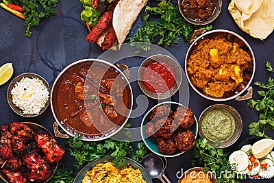 Selection of Indian food with various bowls of food Stock Photo