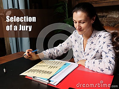 Selection of a Jury sign. Closeup portrait of unrecognizable successful Businesswoman wearing formal suit reading documents Stock Photo