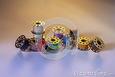 Selection of metal sewing machine bobbins Stock Photo