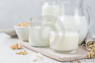 Selection of non-dairy milk alternatives in different bottles. Lactose free milk. healthy lifestyle concept Stock Photo