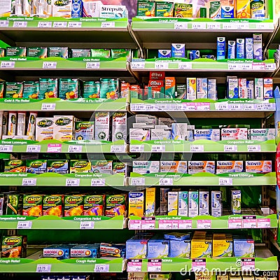 Selection of Over The Counter Cold and Flu Medicines Editorial Stock Photo
