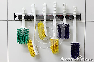 Selection of six colorful, industrial, nylon,used brushes Stock Photo