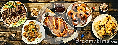 Selection of traditional hanukkah food for festive dinner, wood background Stock Photo